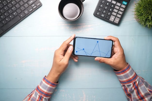 A person's hand holding a smartphone displaying a financial tracking app, with various charts and graphs indicating growth. In the background, there's a blurred vision of coins, paper money, and a small plant, symbolizing growth and profit. The focus is on the digital interface and its clear, easy-to-understand data.