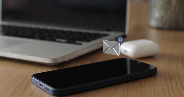 A smartphone displaying an SMS message and a laptop with a web push notification, alongside email icons, illustrating an integrated multi-channel marketing approach.