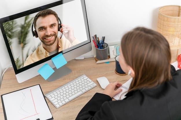 A consultant on a video call, actively listening and taking notes, demonstrating engagement and personalized service in an online consulting session.